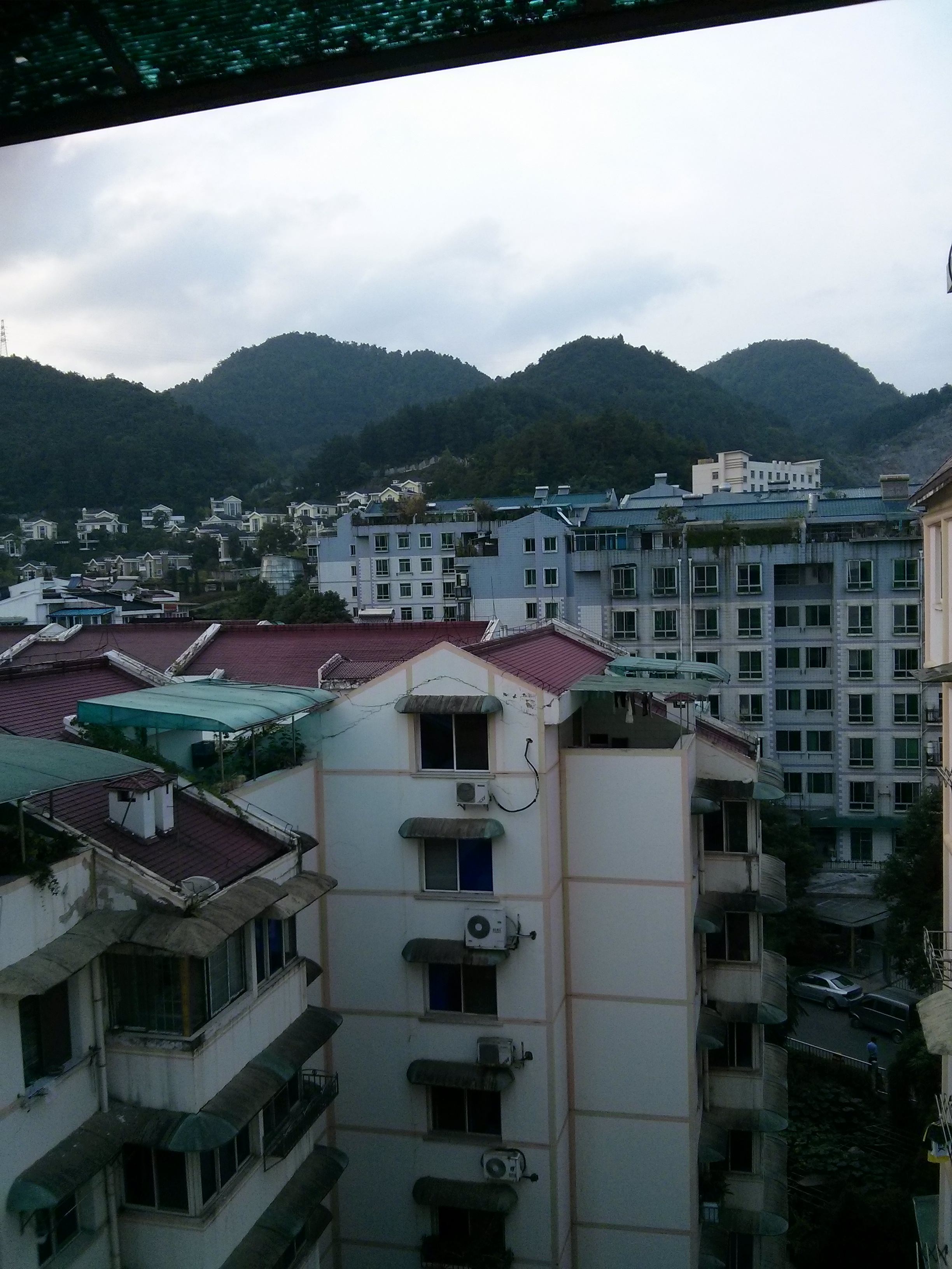 This was the view from our living room window in our last apartment.  Guiyang has basically been carved into the mountains.  Today we scooted through 3 tunnels as we explored the city.  If a mountain is in the way of progress...they carve a hole into it