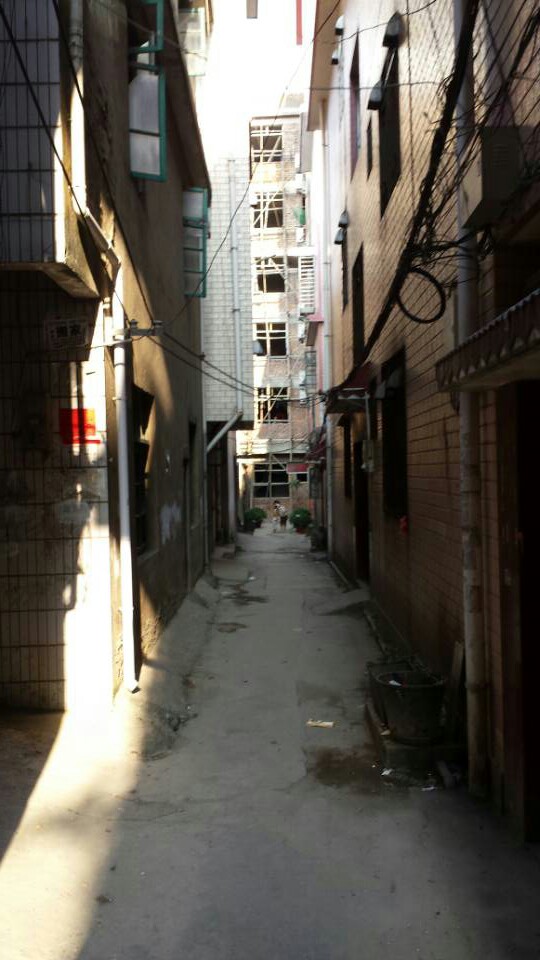 We had to walk down this alley to get to the hostel.  It was a tad disheartening at first, and made us wonder about the hostel we'd booked...
