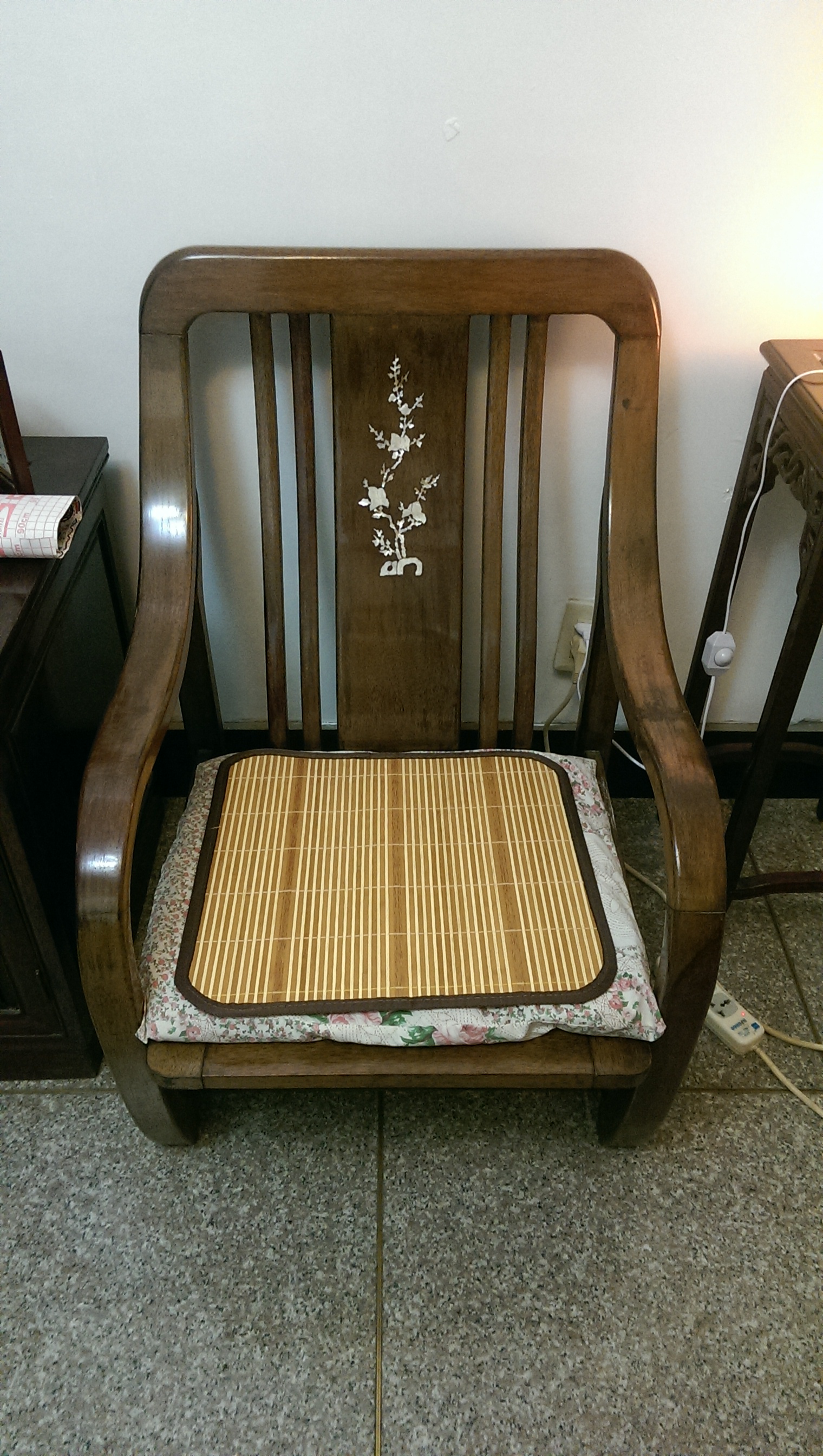 If you listen very closely, you can hear the cushion on this chair whispering 'I'm pointless...I'm pointless..'.  We still have not discovered comfort in China, to my dismay...