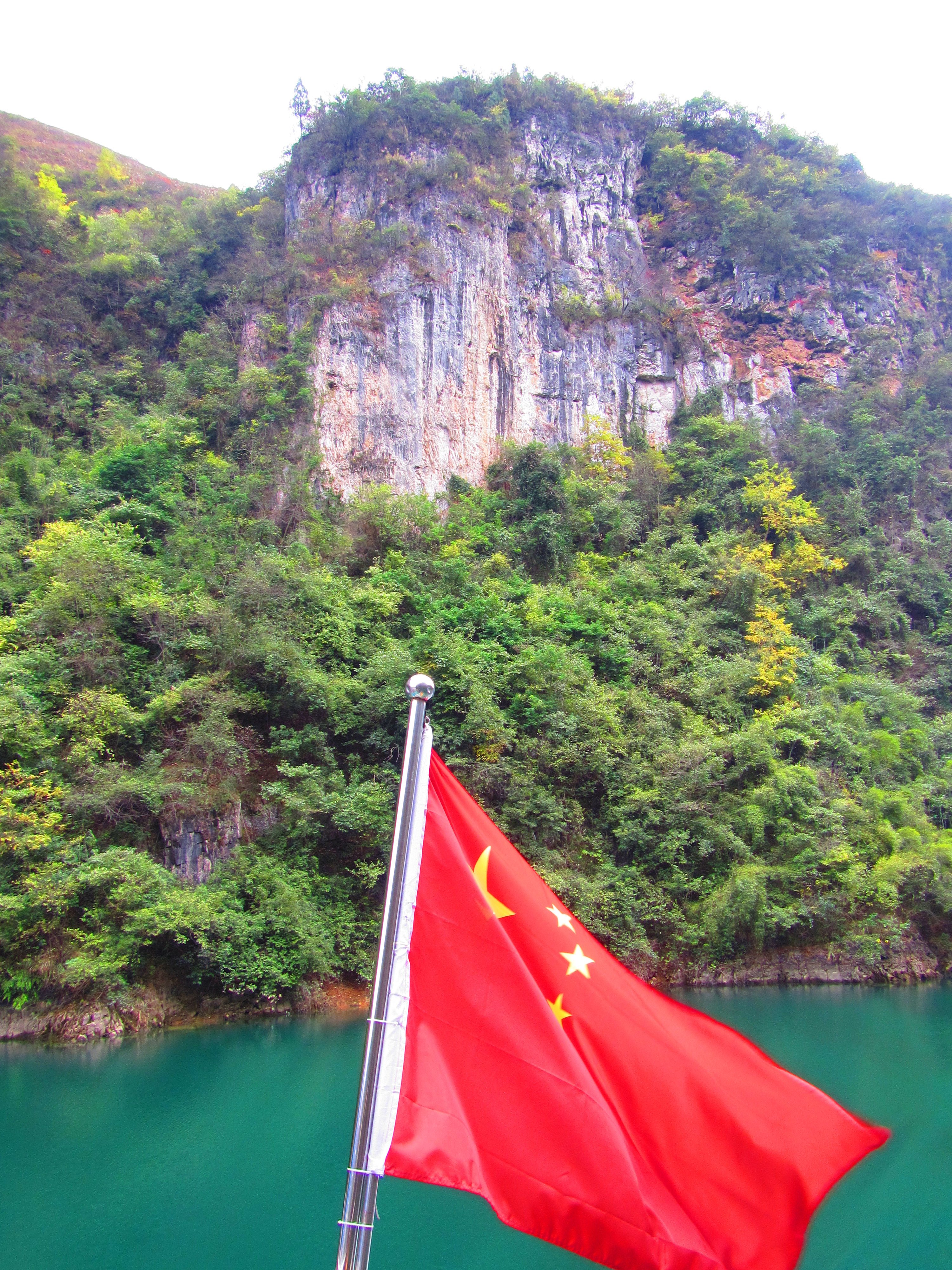 Beautiful Guizhou mountains, and our boat's flag :)