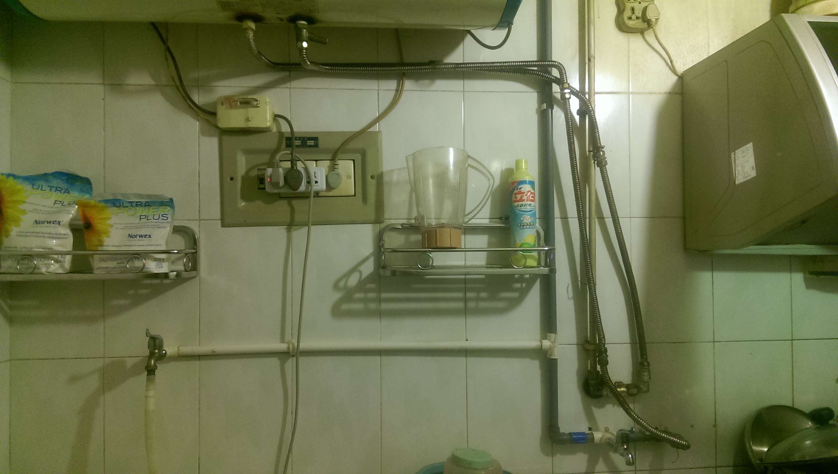 The pipes above our kitchen sink.  They carry the water from the hot water tank to the bathroom.  