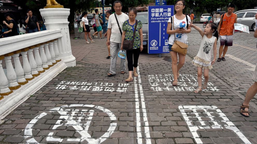 Several cities in China are actually trying out 'cell phone lanes' to help fix pedestrian traffic issues. If you think North America's bad....